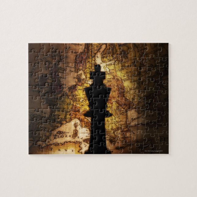 King chess piece on old world map jigsaw puzzle (Horizontal)