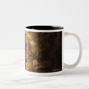 King chess piece on old world map Two-Tone coffee mug