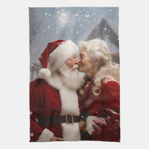 Kissing Mr and Mrs Santa Claus Tea Towel