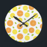 Kitchen Mediterranean Fruit Orange and Lemon Slice Round Clock<br><div class="desc">This fun clock with oranges,  lemons,  and grapes is sure to cheer up any space. It works especially well in kitchens.</div>