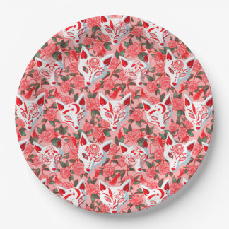 Kitsune masks and blooming camellia on pink paper plate
