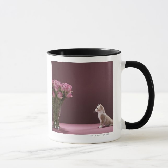 Kitten looking at vase of roses mug (Right)