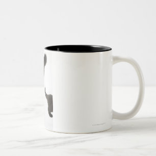 Kitten Looking up at its Mother's Tail Two-Tone Coffee Mug