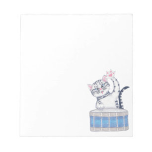 Kitten Playing a Drum Notepad