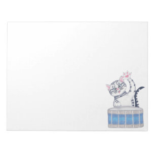 Kitten Playing a Drum Notepad