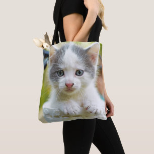 Kitten Rides A Bike Tote Bag