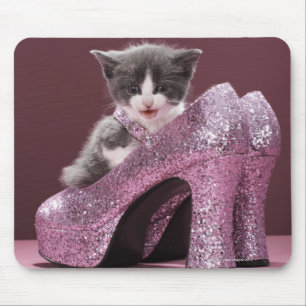 Kitten sitting in glitter shoes mouse pad