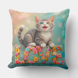 Kitten Sitting on Colourful Flowered LOVE Letters Cushion