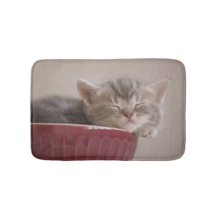 Kitten Sleeping In A Bowl Bath Mat