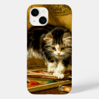 Kitten with Paint and Brushes