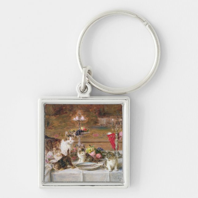 Kittens at a banquet, 19th century key ring (Front)