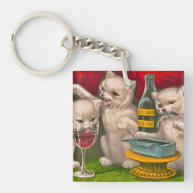 Kittens drinking and eating sardine fish key ring (Front)