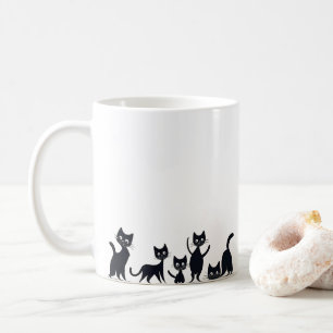 Kittens in different positions coffee mug