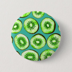 Kiwi slices on turquoise 6 cm round badge