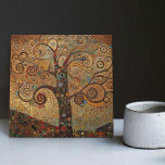 Klimt Golden Tree of Life Abstract Art Nouveau Cer Ceramic Tile<br><div class="desc">This stunning ceramic tile showcases an abstract Tree of Life inspired by Gustav Klimt's "golden phase." Klimt was fascinated by Byzantine mosaics and developed his own mosaic technique using gold leaf and bright colours. This artwork pays tribute to Klimt's innovative approach to mosaic and captures the opulent beauty of his...</div>