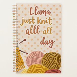Knit scarf and holding knitting needles Planner