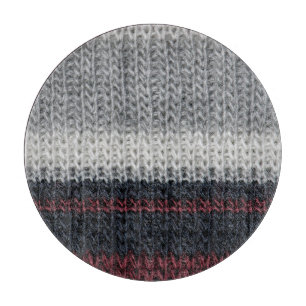 Knitting wool: red, white stripes. cutting board