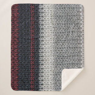 Knitting wool: red, white stripes. sherpa blanket