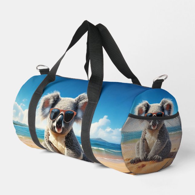 Koala on a sandy beach  duffle bag (Right Corner)