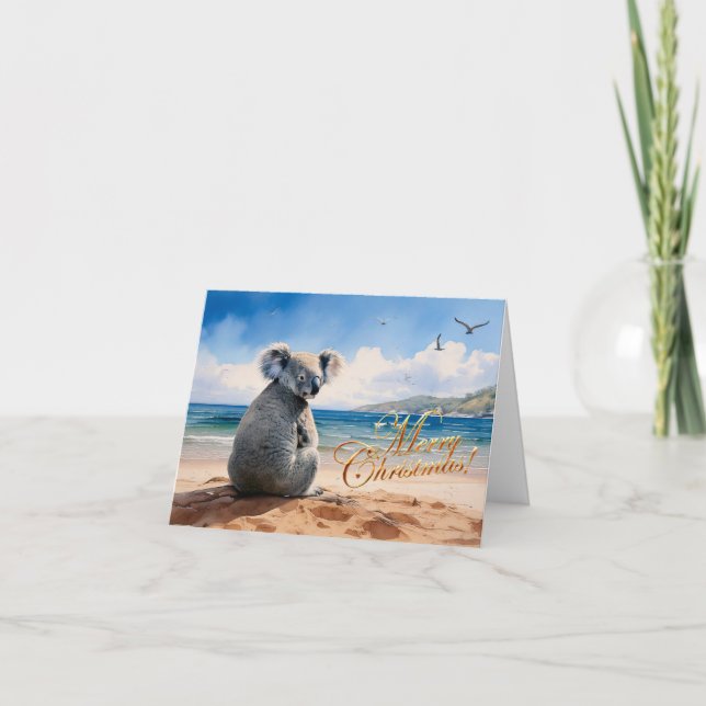 Koala on a sandy beach Merry Christmas Card (Front)