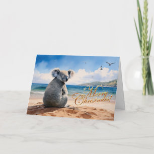 Koala on a sandy beach Merry Christmas Card