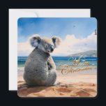Koala on a sandy beach Merry Christmas Holiday Card<br><div class="desc">Iconic Australian Koala soaking up the sun and sea on a sandy beach with a clear blue sky Merry Christmas greeting on front Merry Christmas and Happy New Year on back This furry koala is a native of Australia they are easily recognisable by their stout, tailless body and large head...</div>