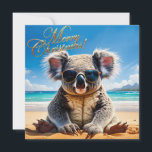 Koala on a sandy beach Merry Christmas Holiday Card<br><div class="desc">Koala sitting on a sandy beach wearing sunglasses.  "Merry Christmas" greeting on front
"Merry Christmas and Happy New Year"  on back

This furry koala is a native of Australia they are easily recognisable by their stout,  tailless body and large head with round,  fluffy ears and large,  spoon-shaped nose.</div>