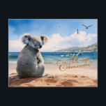 Koala on a sandy beach Merry Christmas Postcard<br><div class="desc">FRONT:  Koala sitting on a sandy beach with "Merry Christmas" text

This furry koala is a native of Australia they are easily recognisable by their stout,  tailless body and large head with round,  fluffy ears and large,  spoon-shaped nose.</div>