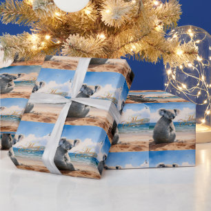 Koala on a sandy beach Merry Christmas Wrapping Paper