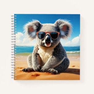 Koala on a sandy beach notebook