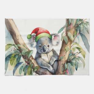 Koala Santa Hat sitting in a gumtree Tea Towel