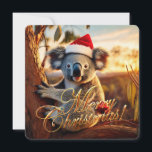 Koala sitting in Gumtree Merry Christmas Holiday Card<br><div class="desc">Australian koala sitting in a gumtree wearing a santa hat. Merry Christmas greeting on front Merry Christmas and Happy New Year on back This furry koala is a native of Australia they are easily recognisable by their stout, tailless body and large head with round, fluffy ears and large, spoon-shaped nose....</div>