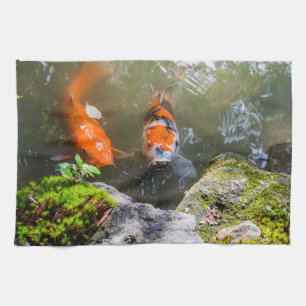 Koi fish in a pond tea towel