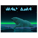 Kuvianak Innovia - Ice Edge Polar Bear Photo Sculpture Magnet<br><div class="desc">A peaceful moment in the long Arctic night. A Polar Bear rests at the edge of an open area in the pack ice. The Northern Lights glow in the distance; bright stars twinkle overhead. Inuktitut text reading, "Kuvianak Innovia" (ᑯᕕᐊᓇᒃ ᐃᓄᕕᐊ - Merry Christmas), in the syllabic alphabet adopted by the...</div>