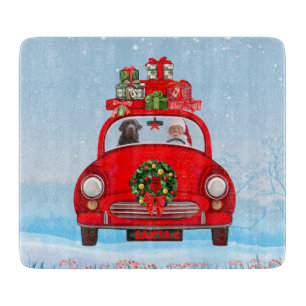 Labrador Dog In Car With Santa Claus  Cutting Board