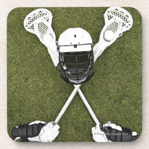 Lacrosse sticks, gloves, balls and sports helmet coaster