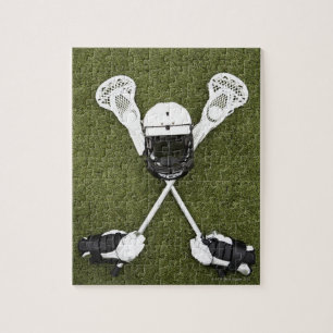 Lacrosse sticks, gloves, balls and sports helmet jigsaw puzzle