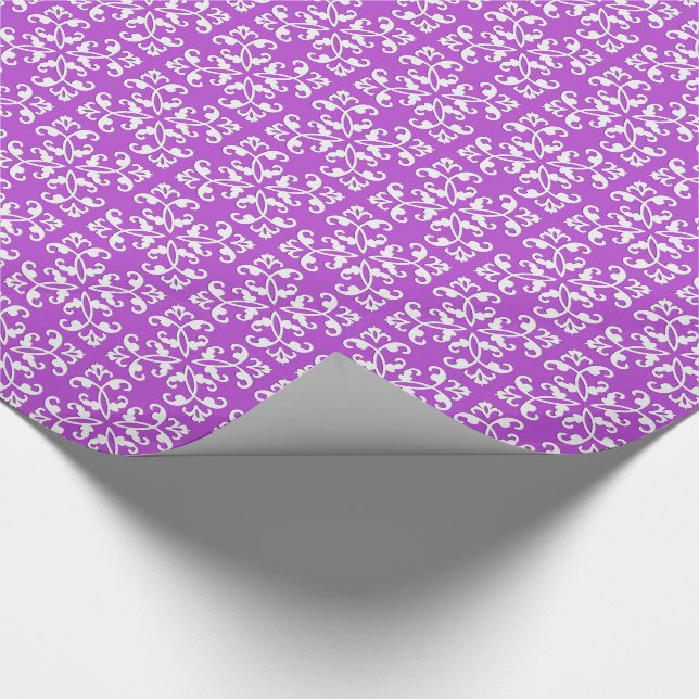 Lacy cutwork - white over amythyst purple wrapping paper (Corner)