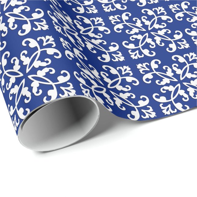 Lacy cutwork - white over lapis blue wrapping paper (Roll Corner)