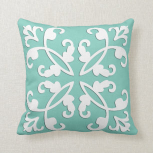 Lacy cutwork - white over seafoam green cushion