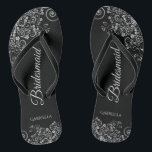 Lacy Silver on Black Elegant Bridesmaid Wedding Thongs<br><div class="desc">These elegant wedding flip flops are a great way to thank and recognise your bridesmaids, while giving their feet a rest after a long day. The beautiful design features an elegant design with ornate silver grey frills on a black background and fancy grey script lettering. The text reads Bridesmaid with...</div>