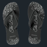 Lacy Silver on Black Elegant The Bride Wedding Thongs<br><div class="desc">Dance the night away with these beautiful wedding flip flops. Designed for the bride, they feature a simple yet elegant design with grey script lettering on a classic black background and fancy silver grey decorative curls and swirls. Beautiful way to stay fancy and appropriate while giving your feet a break...</div>