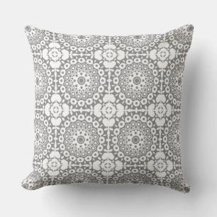 Lacy white squares on a light grey background cushion