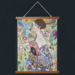 Lady with A Fan, Gustav Klimt Hanging Tapestry<br><div class="desc">Gustav Klimt (July 14, 1862 – February 6, 1918) was an Austrian symbolist painter and one of the most prominent members of the Vienna Secession movement. Klimt is noted for his paintings, murals, sketches, and other objets d'art. In addition to his figurative works, which include allegories and portraits, he painted...</div>