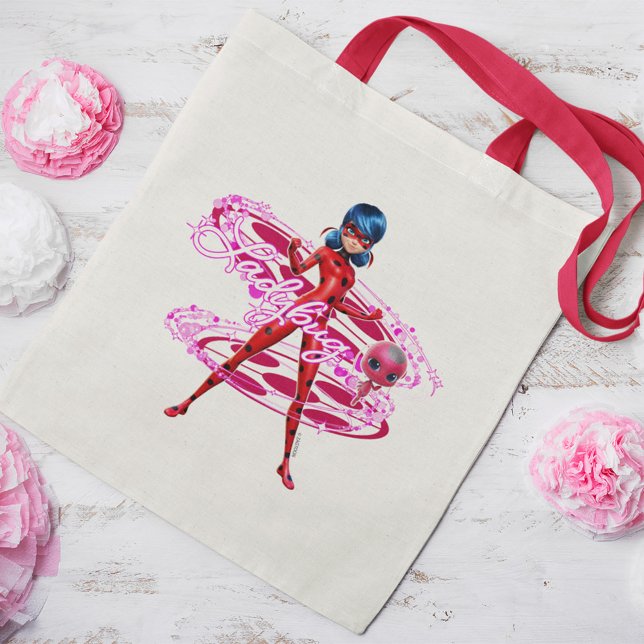 Ladybug and Tikki Graphic Tote Bag (Tote bag on table)