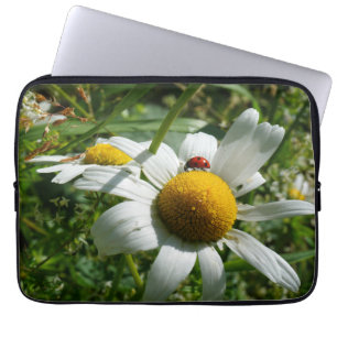 Ladybug on daisy in nature. laptop sleeve