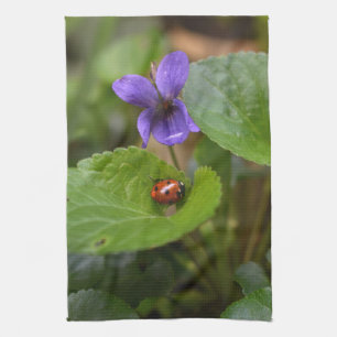 Ladybug on Sweet Violet Flowers Tea Towel