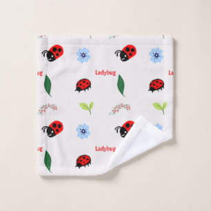 Ladybug pattern on grey wash cloth