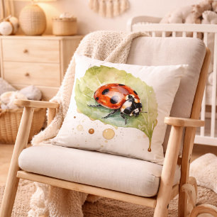 Ladybug sitting on a leaf in vibrant watercolor cushion