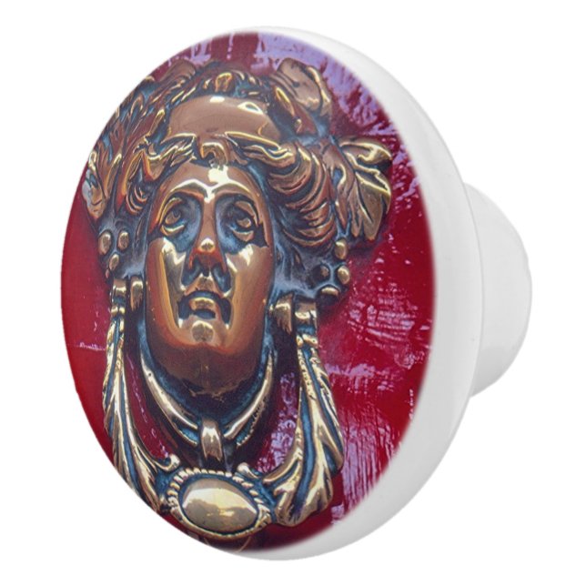 LADY'S HEAD BRASS DOOR KNOCKER (PHOTOG).ON RED CERAMIC KNOB (Right)